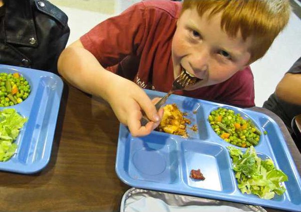 Red-haired-kid-eating