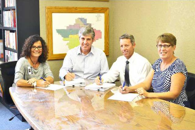 TUSD bond signing 2