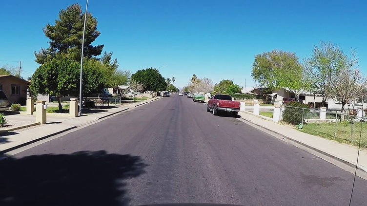 videoblocks-driving-viewpoint-residential-neighborhood-street-mesa-arizona_bxunkg-cg_thumbnail-full01.png