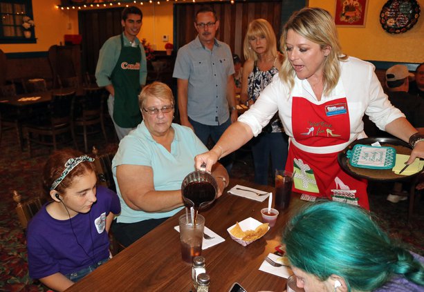 Shannon Sanford waits tables.jpg