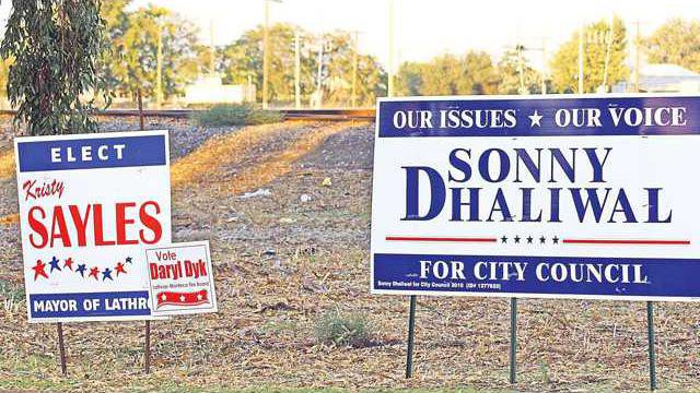 lathropelectionsaylessign1