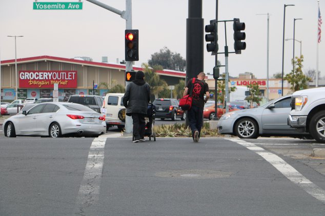 homeless cross street