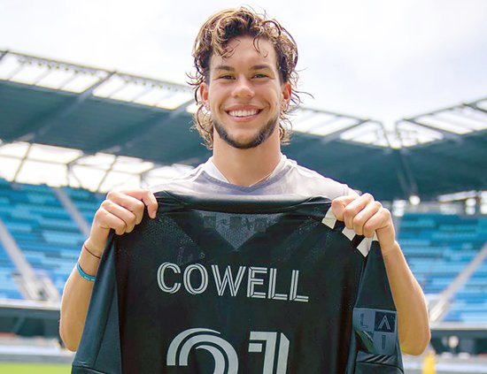 Cowell holds jersey