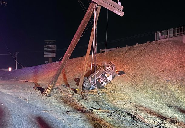 Service Road crash takes out poles