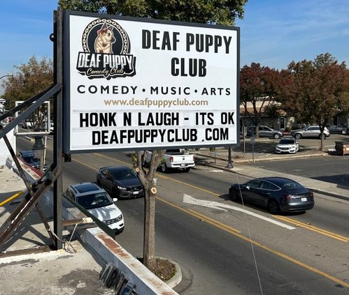comedy sign