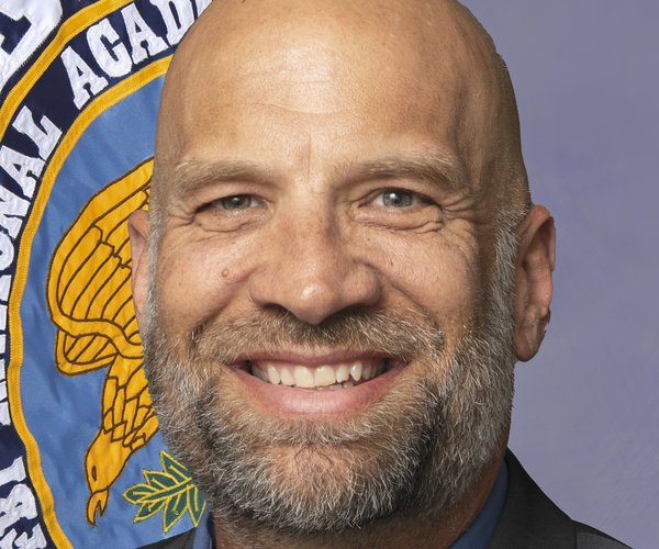 Travis Hudson is back from the FBI Academy