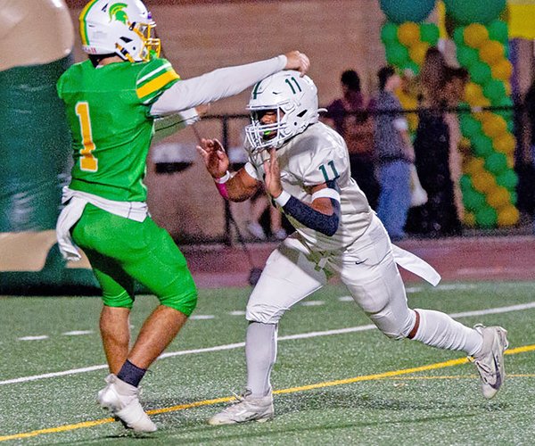 Damian Jackson pressures Grace Davis’ Caleb Zaragoza