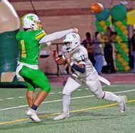 Damian Jackson pressures Grace Davis’ Caleb Zaragoza