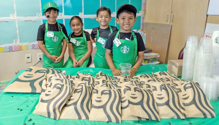 Lucas students donned Starbucks aprons
