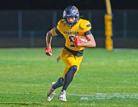 Hughson senior Lincoln Sousa runs