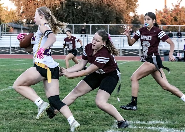 Flag football girls, cross country team host events