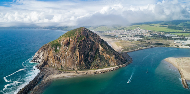 Where can you find a castle, great beaches, a big rock, wineries galore, a unique urinal & gum stuck on a wall?