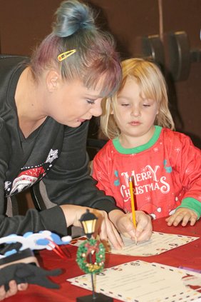 Tiffany Wood helped her daughter, Ella Schoen-Wood