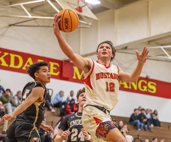 Varsity hoop boys top Enochs as winter sports continue