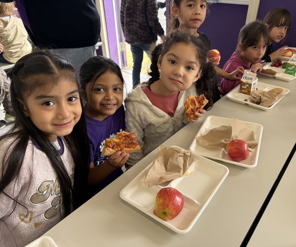 Denair kids eating pizza