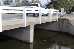 Service Road canal bridge woes