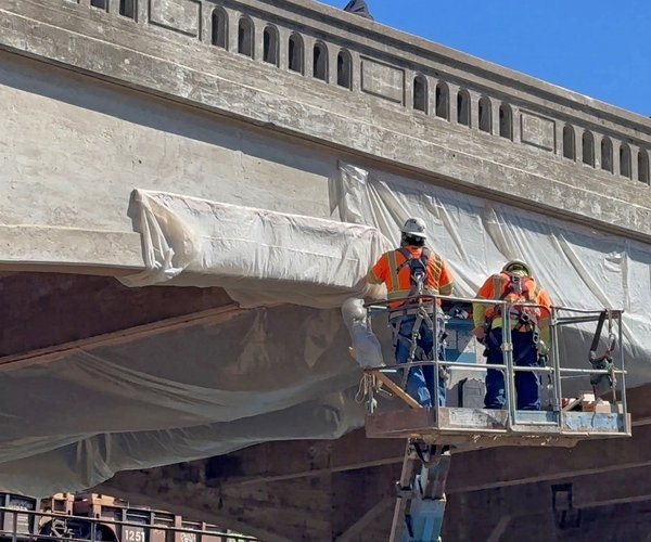 Crews wrapping bridge