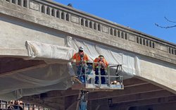 Crews wrapping bridge