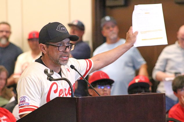 Ontiveras held up a copy