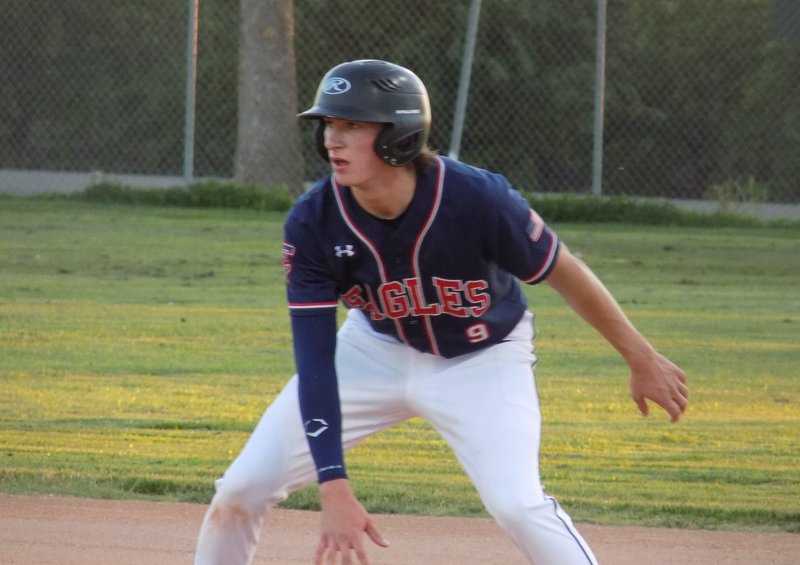 Jake Dein leading from first base.