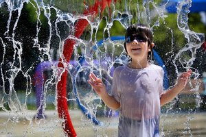 kid in water