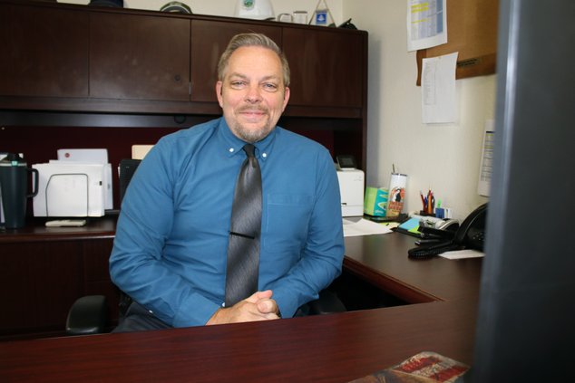 Steve Williams at desk