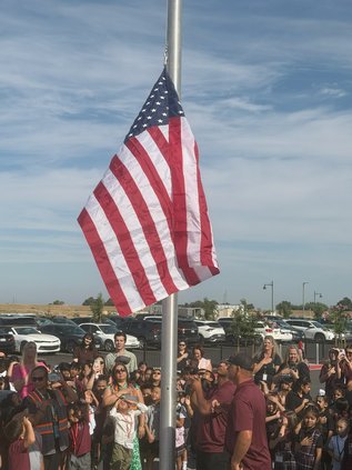 flag raising RI school